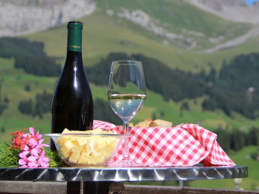 Geführte Dorfrundfahrt und Aperitif mit Einheimischen aus Adelboden
